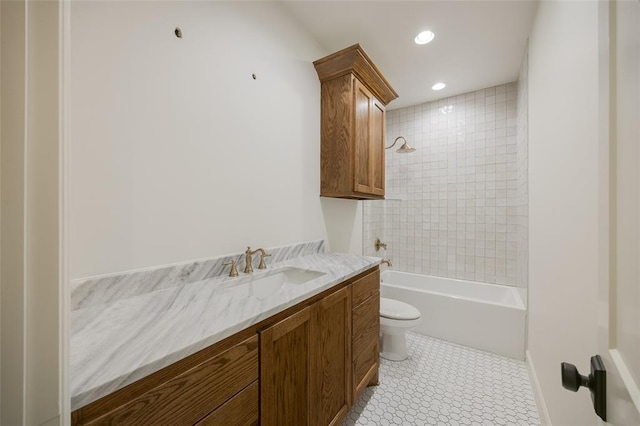 bathroom with vanity, toilet, recessed lighting, and  shower combination