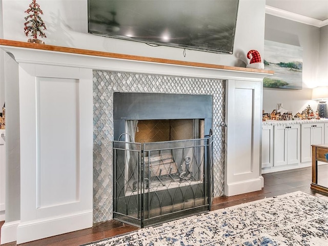 3537 W Fox Ln, Newcastle, OK 73065 - room details with ornamental molding, a tile fireplace, and wood finished floors