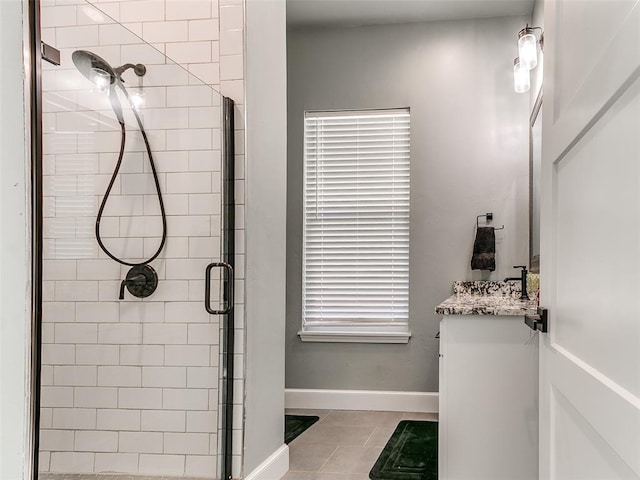 3537 W Fox Ln, Newcastle, OK 73065 - bathroom with tile patterned flooring, a shower stall, vanity, and baseboards