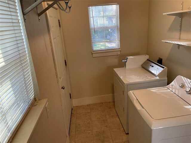 224 E Ayers St, Edmond, OK 73034 - clothes washing area featuring baseboards, laundry area, and independent washer and dryer