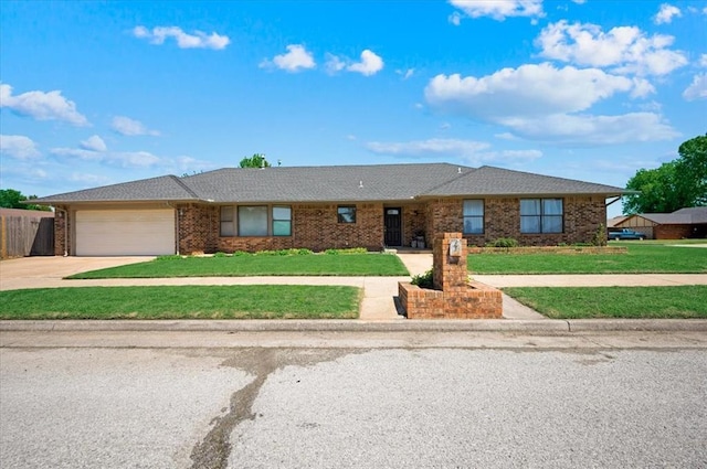 ranch-style home with driveway, a front yard, brick siding, fence, and an attached garage