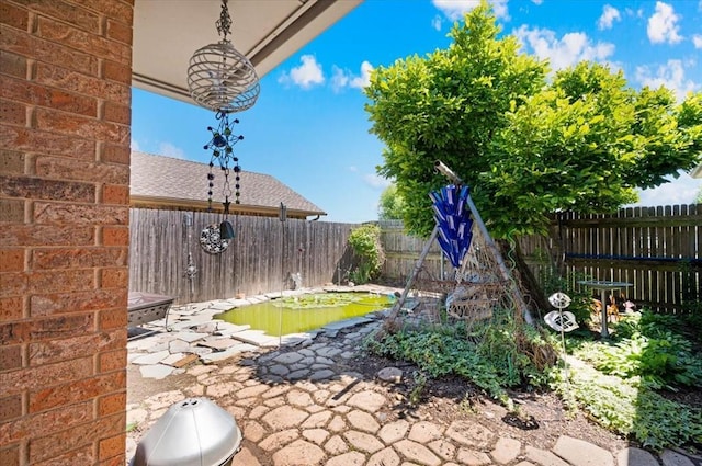 view of yard featuring a fenced backyard