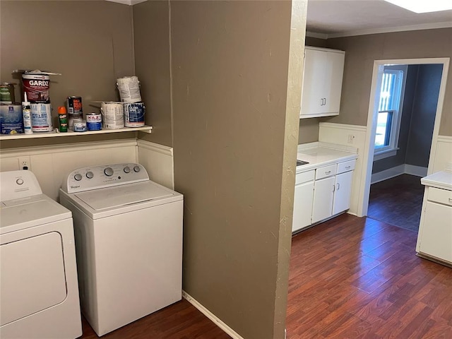 230 E Ayers St, Edmond, OK 73034 - washroom with dark wood-style floors, cabinet space, crown molding, and washing machine and dryer