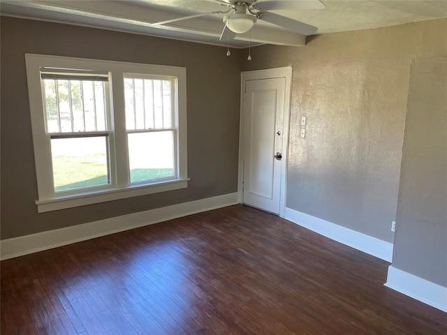 230 E Ayers St, Edmond, OK 73034 - spare room with dark wood-style floors, a ceiling fan, and plenty of natural light
