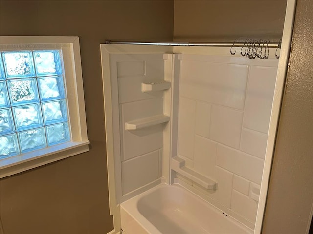 230 E Ayers St, Edmond, OK 73034 - bathroom featuring plenty of natural light and tub / shower combination