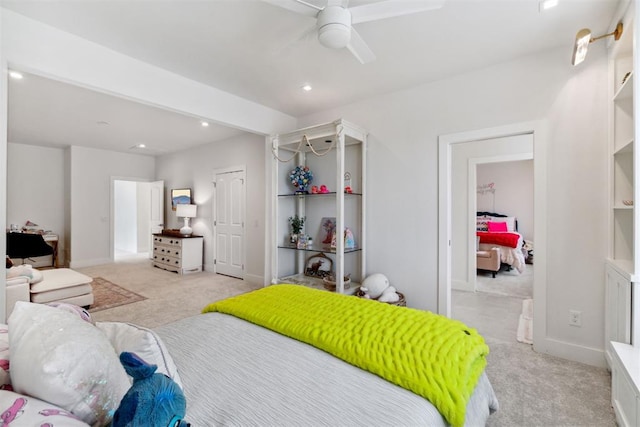bedroom featuring ceiling fan, recessed lighting, baseboards, and light carpet