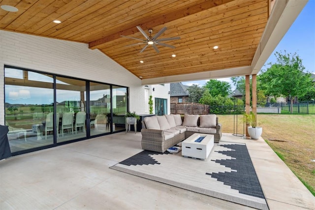 view of patio / terrace featuring an outdoor hangout area, a ceiling fan, and a fenced backyard