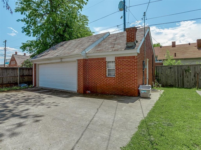 garage featuring fence