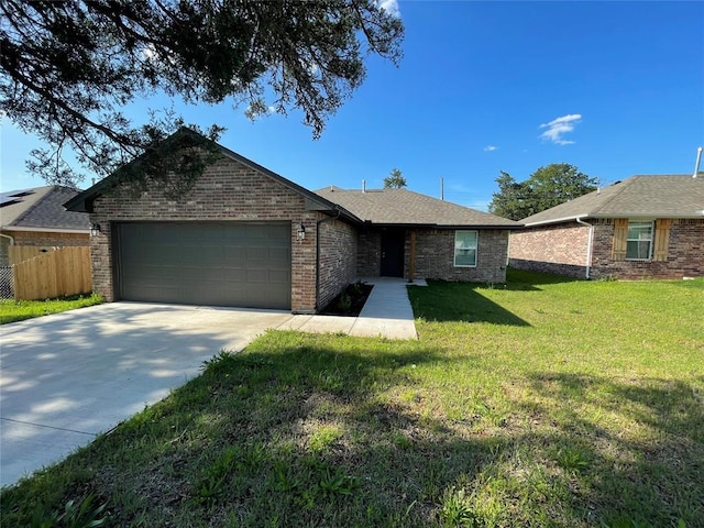 ranch-style home featuring a garage, brick siding, fence, a front lawn, and concrete driveway