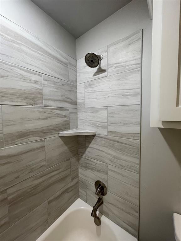 full bathroom with shower / tub combination