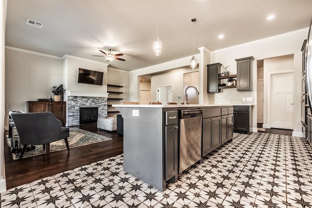 kitchen featuring a fireplace, ceiling fan, open shelves, visible vents, and stainless steel dishwasher