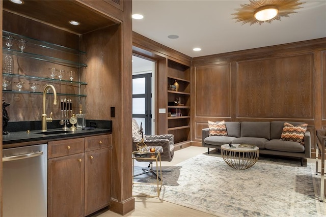 1421 Glenbrook Ter, Nichols Hills, OK 73116 - bar with stainless steel dishwasher, built in shelves, a sink, and indoor wet bar