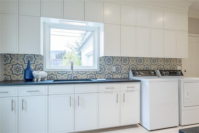 1421 Glenbrook Ter, Nichols Hills, OK 73116 - laundry area featuring a sink, cabinet space, and washer and dryer