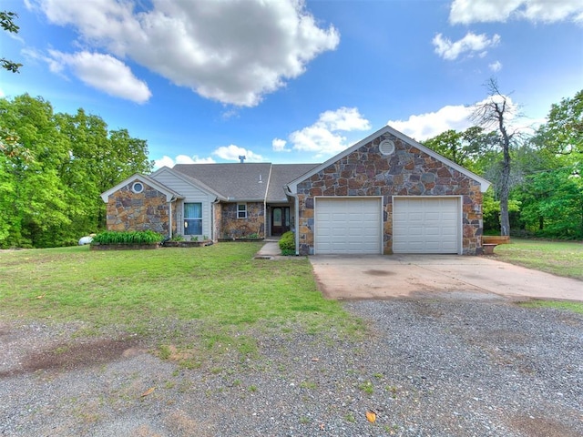single story home featuring a garage, concrete driveway, a front lawn, and stone siding