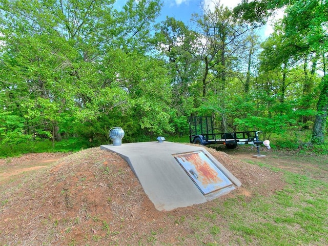 view of entry to storm shelter