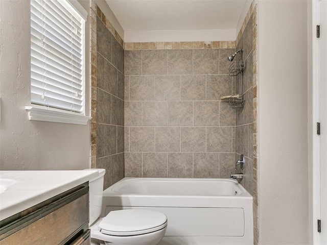 full bath featuring bathing tub / shower combination, vanity, and toilet