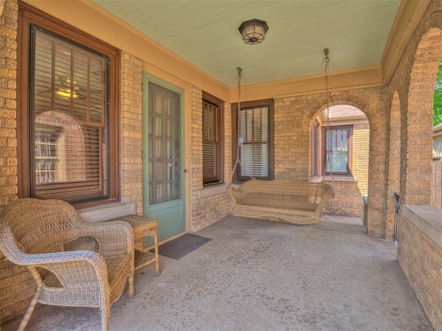 view of patio featuring a porch