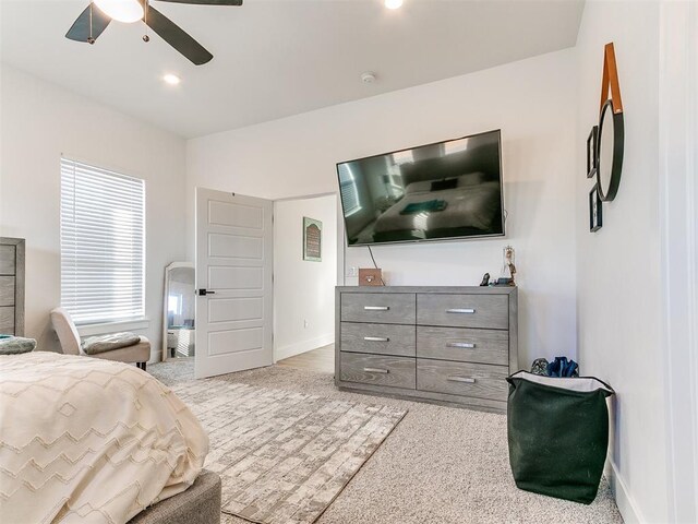 bedroom with baseboards, a ceiling fan, and recessed lighting