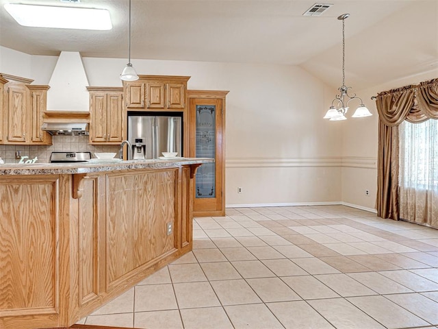 kitchen with visible vents, light tile patterned floors, extractor fan, and stainless steel fridge with ice dispenser