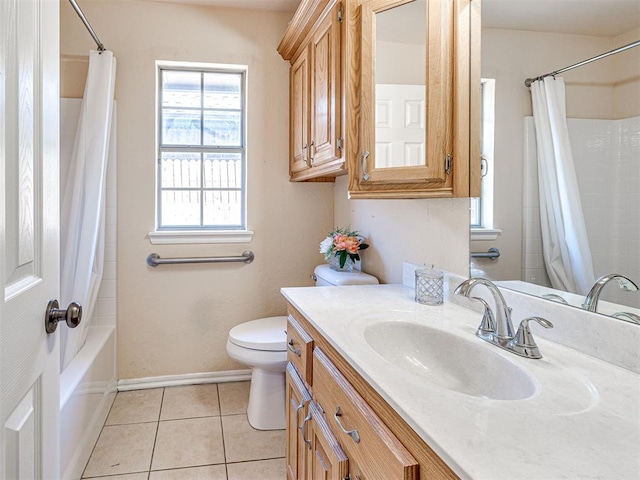 full bathroom with tile patterned flooring, vanity, baseboards, toilet, and shower / tub combo with curtain