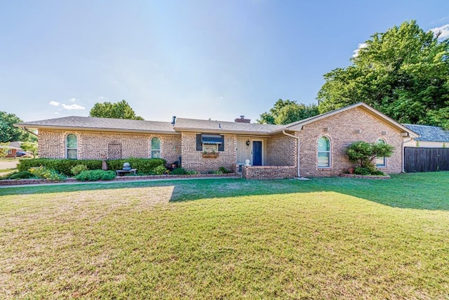 237 E 30th St, Edmond, OK 73013 - ranch-style home featuring brick siding and a chimney
