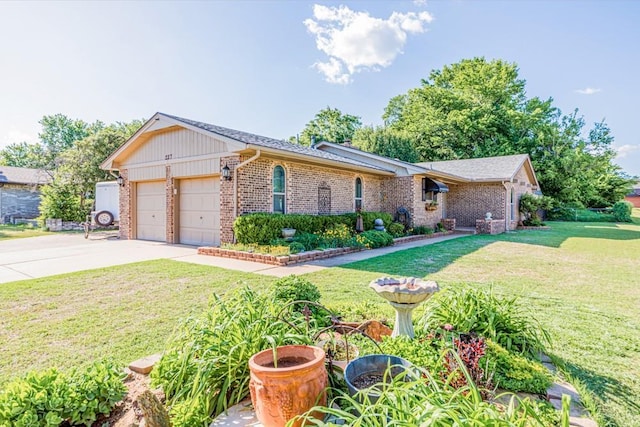 237 E 30th St, Edmond, OK 73013 - ranch-style home with brick siding, a garage, a front lawn, and driveway