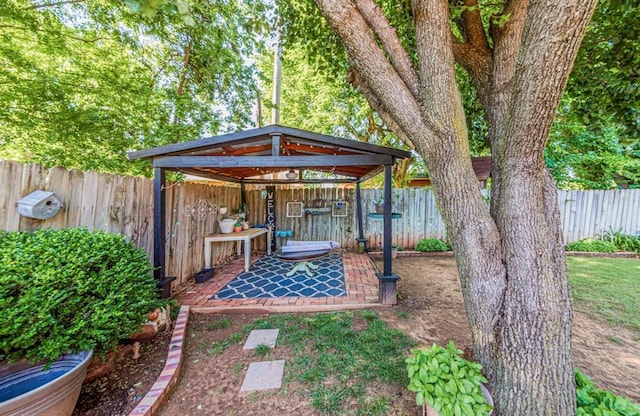 237 E 30th St, Edmond, OK 73013 - fenced backyard with a gazebo and a patio area