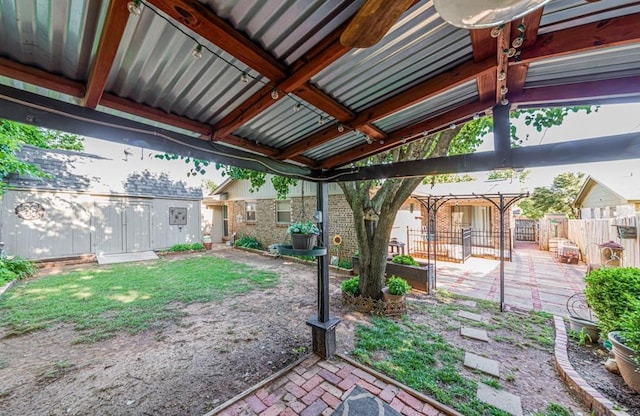 237 E 30th St, Edmond, OK 73013 - fenced backyard with a patio area