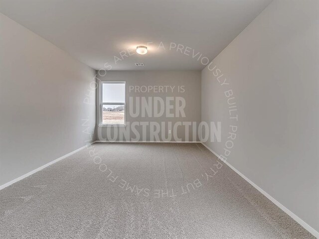 3813 S Ravine St, Stillwater, OK 74074 - carpeted spare room with baseboards and visible vents