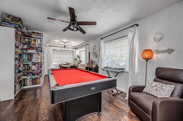 rec room with pool table, a ceiling fan, dark wood finished floors, and a textured ceiling
