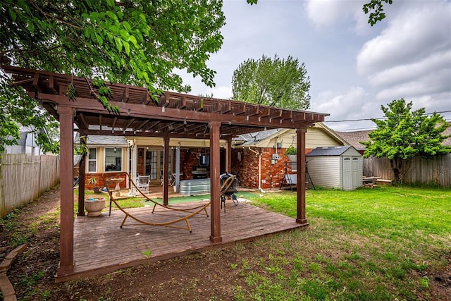 exterior space featuring a storage shed, a wooden deck, a fenced backyard, a pergola, and a jacuzzi