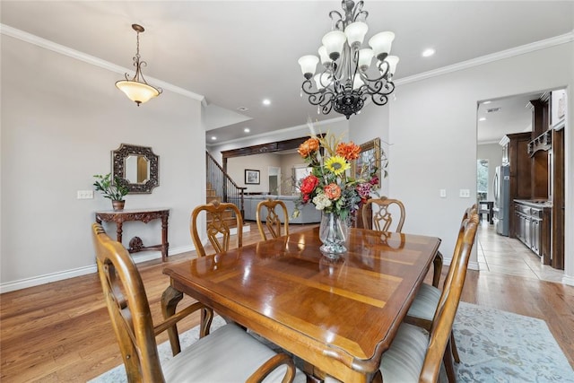 532 Conquistador Ct, Edmond, OK 73025 - dining room featuring recessed lighting, light wood-type flooring, crown molding, stairs, and baseboards