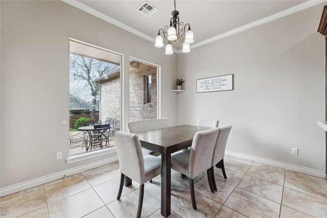 532 Conquistador Ct, Edmond, OK 73025 - dining room featuring an inviting chandelier, visible vents, crown molding, and baseboards