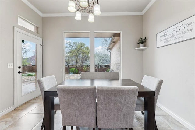532 Conquistador Ct, Edmond, OK 73025 - dining area with a chandelier, ornamental molding, and a wealth of natural light