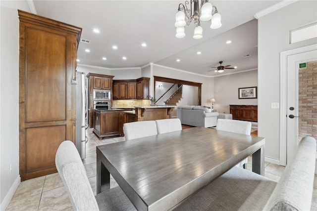 532 Conquistador Ct, Edmond, OK 73025 - dining space featuring crown molding, visible vents, baseboards, light tile patterned flooring, and recessed lighting