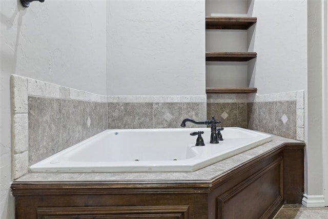 532 Conquistador Ct, Edmond, OK 73025 - bathroom featuring a tub with jets