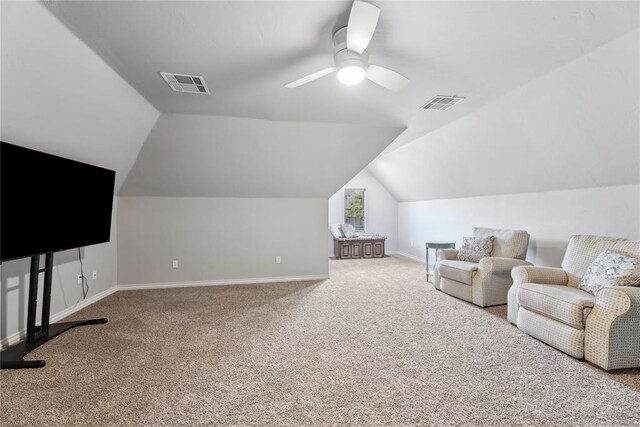 532 Conquistador Ct, Edmond, OK 73025 - carpeted living room featuring visible vents, ceiling fan, vaulted ceiling, and baseboards