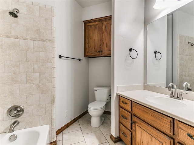 full bathroom with tile patterned flooring, vanity, toilet, baseboards, and tub / shower combination