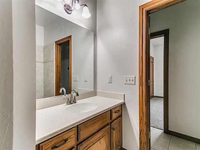 bathroom featuring tile patterned floors and vanity