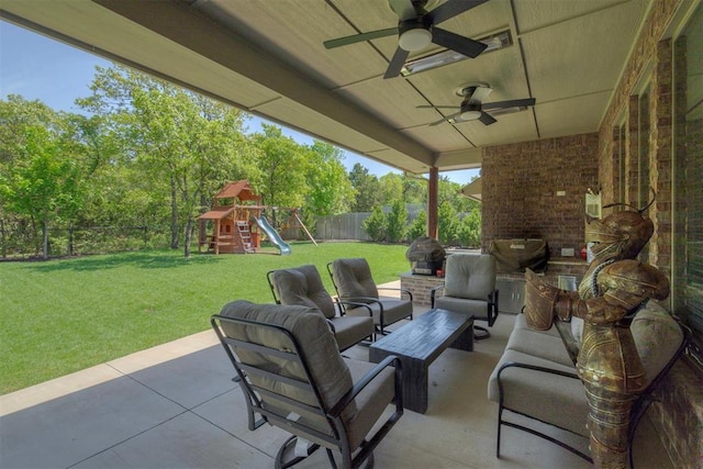 view of patio / terrace with a fenced backyard, ceiling fan, a playground, and outdoor lounge area