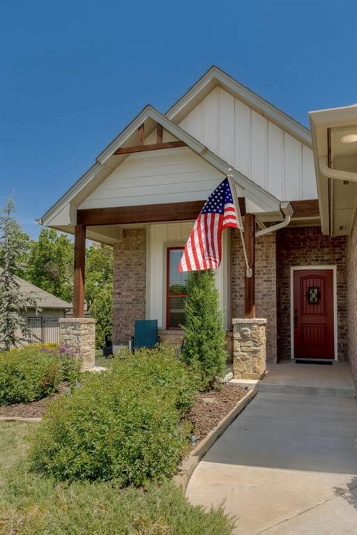 8817 Arya Rd, Arcadia, OK 73007 - view of front facade with brick siding and board and batten siding