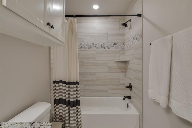 8817 Arya Rd, Edmond, OK 73007 - bathroom featuring shower / tub combo and recessed lighting