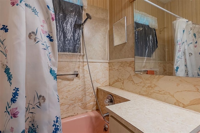 801 Lincoln St, Ryan, OK 73565 - bathroom featuring vanity and shower / tub combo with curtain