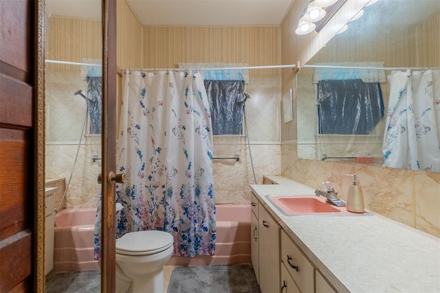 801 Lincoln St, Ryan, OK 73565 - full bath featuring shower / bathtub combination with curtain, vanity, toilet, wallpapered walls, and tile walls