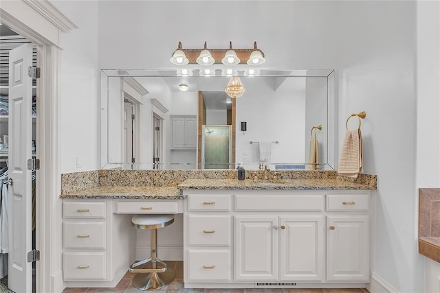 full bathroom featuring visible vents and vanity