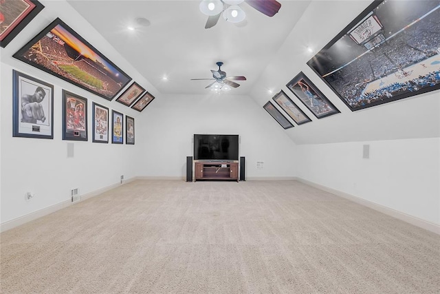 unfurnished living room with visible vents, a ceiling fan, carpet flooring, and lofted ceiling