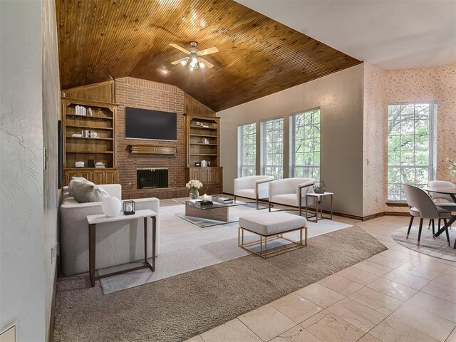 3601 Rena Dawn Ln, Edmond, OK 73013 - living room with built in features, ceiling fan, a healthy amount of sunlight, and vaulted ceiling