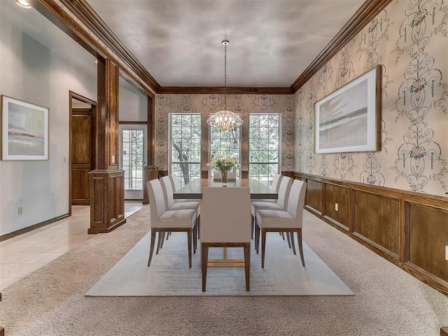 3601 Rena Dawn Ln, Edmond, OK 73013 - dining area featuring an inviting chandelier, crown molding, plenty of natural light, and wallpapered walls