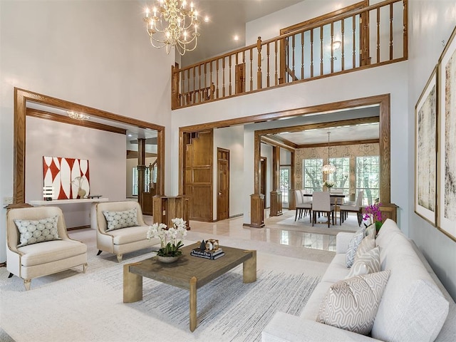 3601 Rena Dawn Ln, Edmond, OK 73013 - living room featuring an inviting chandelier and a towering ceiling