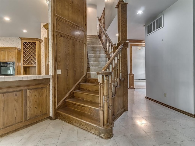 3601 Rena Dawn Ln, Edmond, OK 73013 - stairs with visible vents, recessed lighting, and tile patterned flooring